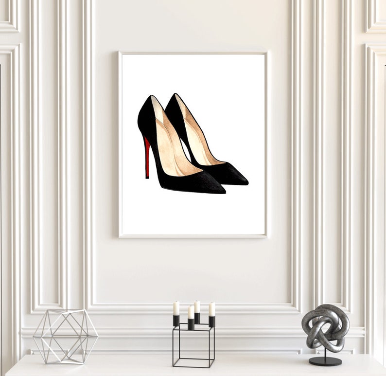 May include: A pair of black high-heeled shoes with red soles. The shoes are pointed-toe and have a stiletto heel.