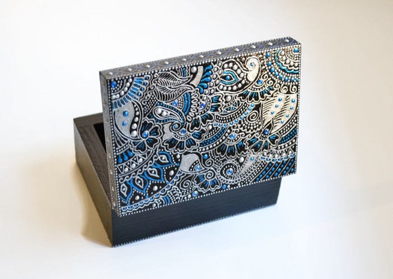 Hand-painted, personalized wooden keepsake box with 153 favorites — silver-blue painted with real detail, the kind of heirloom-feeling gift that gets kept for decades.