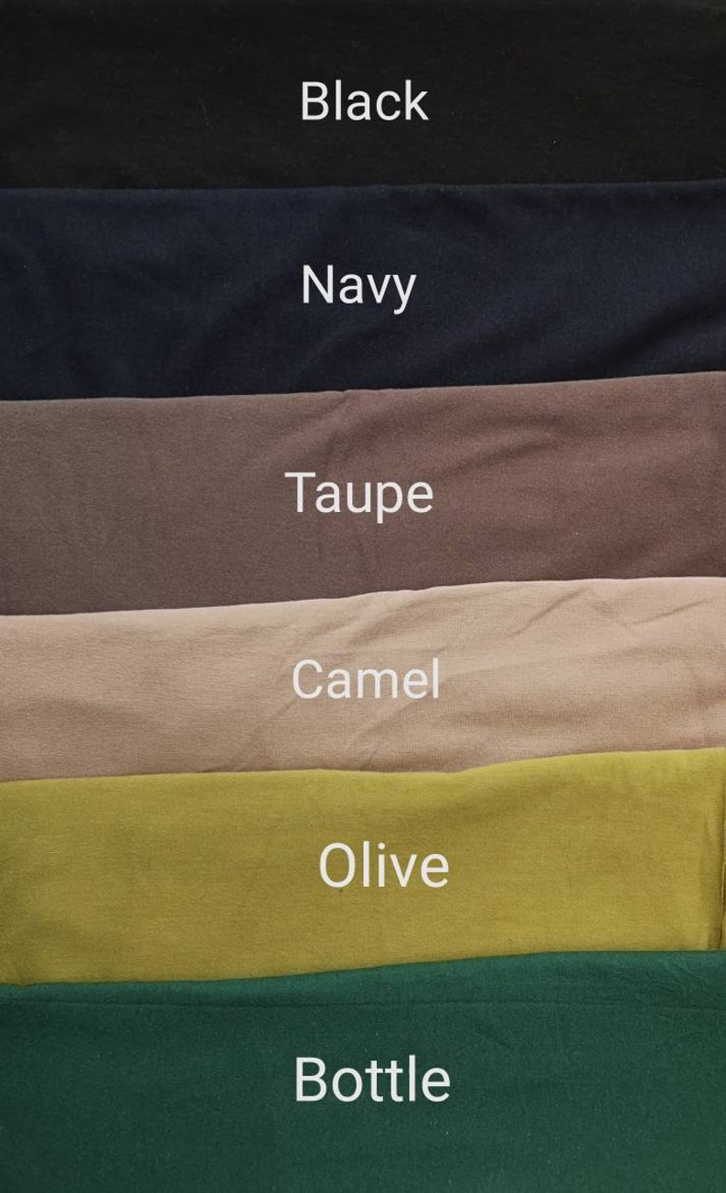 May include: A fabric swatch image showcasing various colors. The colors include black, navy, taupe, camel, olive, and bottle green. Each color is labeled with its name in white text, providing a clear visual reference for each shade.