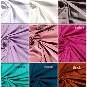 May include: Nine fabric swatches in various colors, including white, ivory, taupe grey, lilac, antique pink, fuchsia, turquoise, peacock, and brick. Each swatch is labeled with its color name.