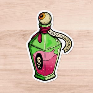 May include: A sticker of a green glass bottle filled with pink liquid, topped with a realistic eyeball stopper. The bottle features a black oval label with a white skull and crossbones, and a beige tag with the text PLOT THICKENER.