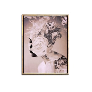 May include: A sepia-toned photograph of a woman with a large white rose covering her face. The rose is surrounded by other flowers and foliage, creating a floral crown effect. The image has a vintage aesthetic.