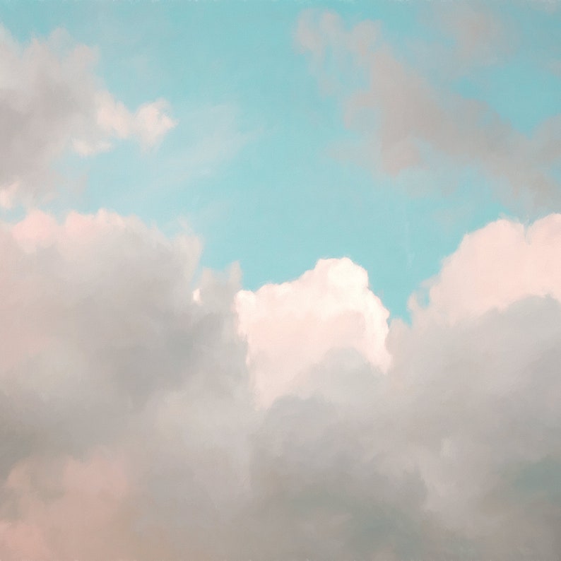 May include: A soft, pastel blue sky with fluffy white clouds. The clouds are clustered together in the lower half of the image, creating a sense of depth and dimension.