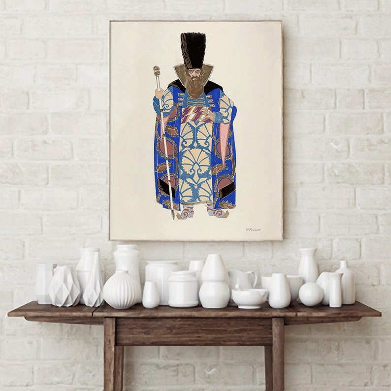 May include: A vintage illustration of a man wearing a blue and gold patterned robe with a tall black hat and holding a staff. The illustration is on a cream background.