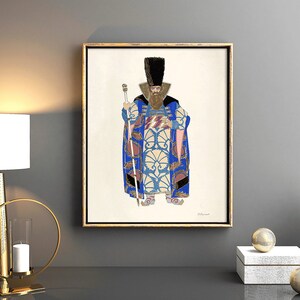 May include: A framed illustration of a man in a blue and gold patterned robe, wearing a black fur hat and holding a staff. The illustration is on a white background with a gold frame.