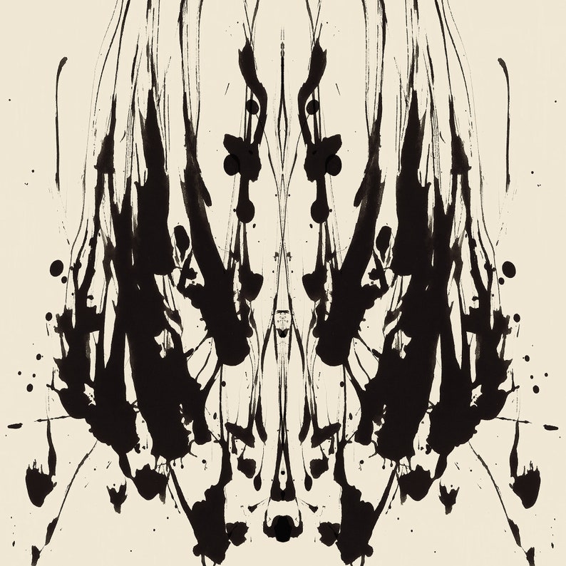 May include: A symmetrical black ink blot on a cream background. The ink blot resembles a face with two eyes, a nose, and a mouth.