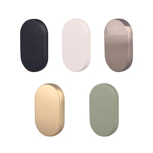 Könnte beinhalten: Fünf ovale Türknauf in verschiedenen Ausführungen: Schwarz, Weiß, Silber, Gold und Grün.