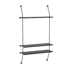 May include: A wall-mounted shelving unit featuring three horizontal black shelves supported by two vertical black metal rods. The rods extend above the top shelf and below the bottom shelf, terminating in small circular wall-mounting fixtures.