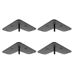 Könnte beinhalten: Vier schwarze Metalleckwinkel mit einer Schraube in der Mitte jedes Winkels. Die Winkel sind für die Befestigung von Regalen oder anderen Gegenständen an einer Wand konzipiert.