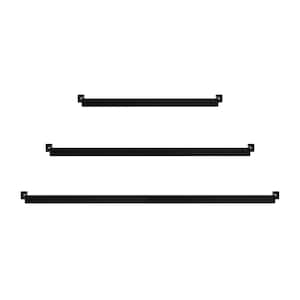 May include: Three black metal shelves with square brackets on each end. The shelves are different lengths, with the top shelf being the shortest and the bottom shelf being the longest.