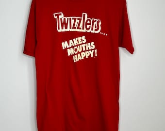 Vintage 1980s Twizzlers liquorice Graphic T shirt Makes mouths happy. Sz M.