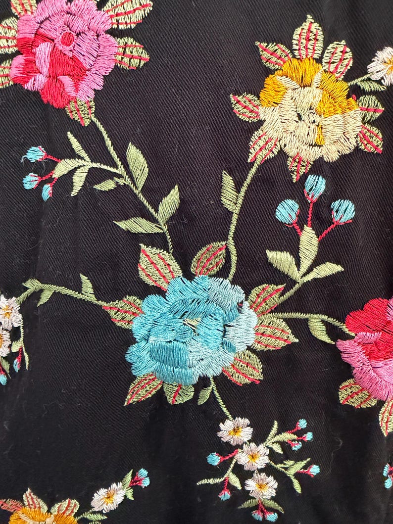 May include: A set of three ceramic mugs with a speckled, matte finish. The mugs are in shades of cream, light gray, and dark gray. Each mug has a simple, modern design and a rounded handle.