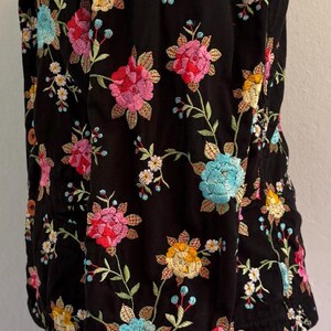 May include: A rustic wooden sign with the text "Welcome to our home" in white lettering. The sign features a distressed finish and a simple, inviting design, perfect for entryway decor.