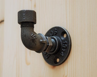 Cast iron coat rack, hook, and wall hook with cast iron stopper