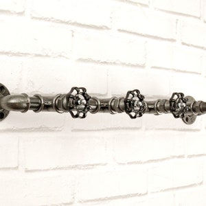 Coat rack, cast iron rack - 4 or more black ruffles