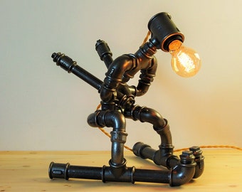 "LE SKIEUR" lamp structure with plumbing connection