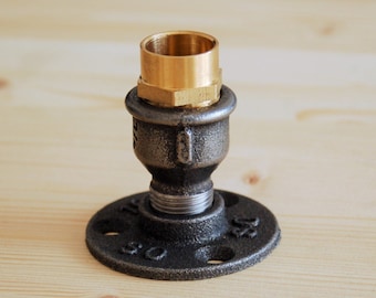 Small candle holder in industrial style plumbing fittings