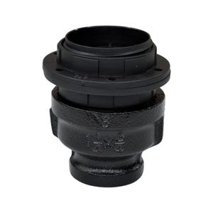 May include: A black metal pipe fitting with a textured finish, featuring a cylindrical shape and a wider top section. The side of the fitting is embossed with the text 1 1/4 x 3/4, indicating its size specifications for plumbing connections.