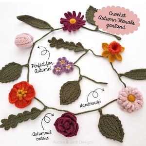 May include: A crochet garland featuring various autumn-colored flowers and green leaves. The flowers include shades of burgundy, orange, yellow, and light pink. Text on the image reads: Crochet Autumn Florals garland, Perfect for Autumn!, Handmade!, and Autumnal colors.