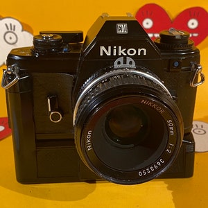 Vintage Nikon EM 35mm SLR Single Lens Reflex All Black Film Camera With 50mm f/2 Ai Manual Prime Lens + Nikon EM Md-e Power Winder