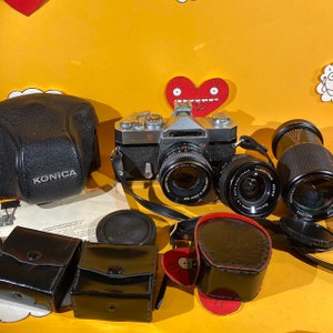 Vintage KONICA Autoreflex T 35mm film camera + Konica hexagon AR 50mm 1.7 + Vivitar 28mm f/2 auto wide angle lens + Adorama mc 70-210mm lens