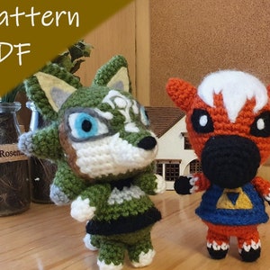 May include: Two handmade crochet animal figures. One is a green and white wolf-like character with blue eyes. The other is an orange and white horse-like character wearing a blue outfit. The image includes the text "Pattern PDF".