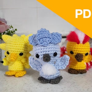 May include: Three crocheted bird plushies. The first is yellow with a spiky crest, the second is blue with a white belly and a spiky crest, and the third is yellow with a red and white crest.