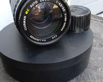 Clubman 1:4.5 -5.5   1=80-200mm. Zoom lens. Fits Nikon cameras.