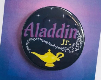 Op Aladdin de op muziek geïnspireerde speld, magneet, knop, muziektheater