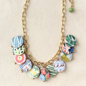Folk Art Discus Wooden Charm Necklace