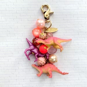 Lenora Dame Favorite Dinosaur Purse Charm in Taffy Pink