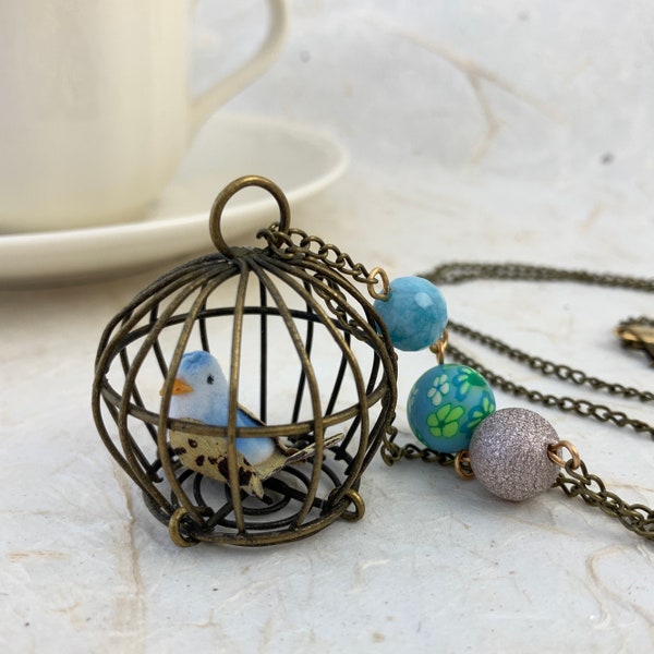 Lenora Dame Little Bird In a Birdcage Pendant Necklace in Cornflower