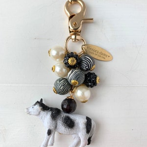 Lenora Dame Cow Bag Charm