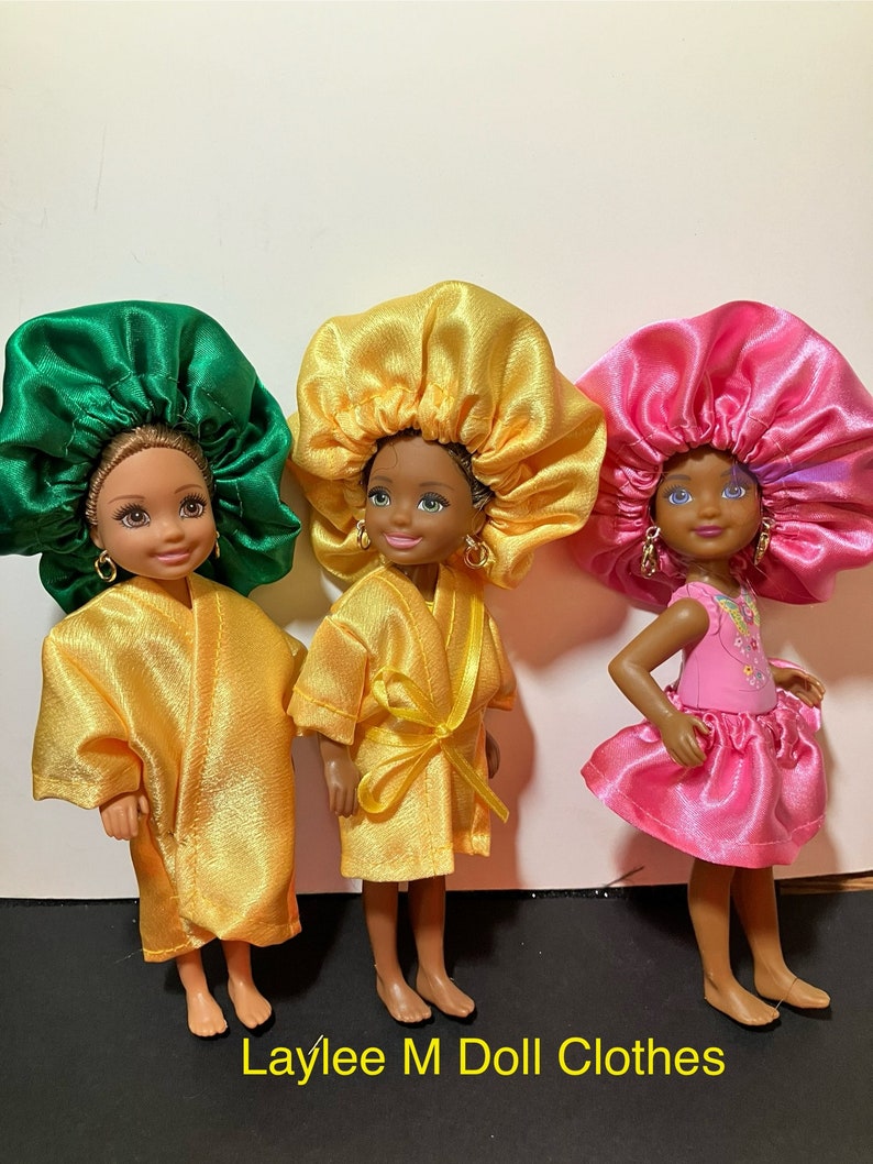 Doll Clothes -  Little Doll Bonnets   by Laylee M Doll Clothes- Free shipping in USA
Single Little Bonnets $9.99
Fits Chelsea Doll
Robes Matching Bonnet Yellow Sets $16.99