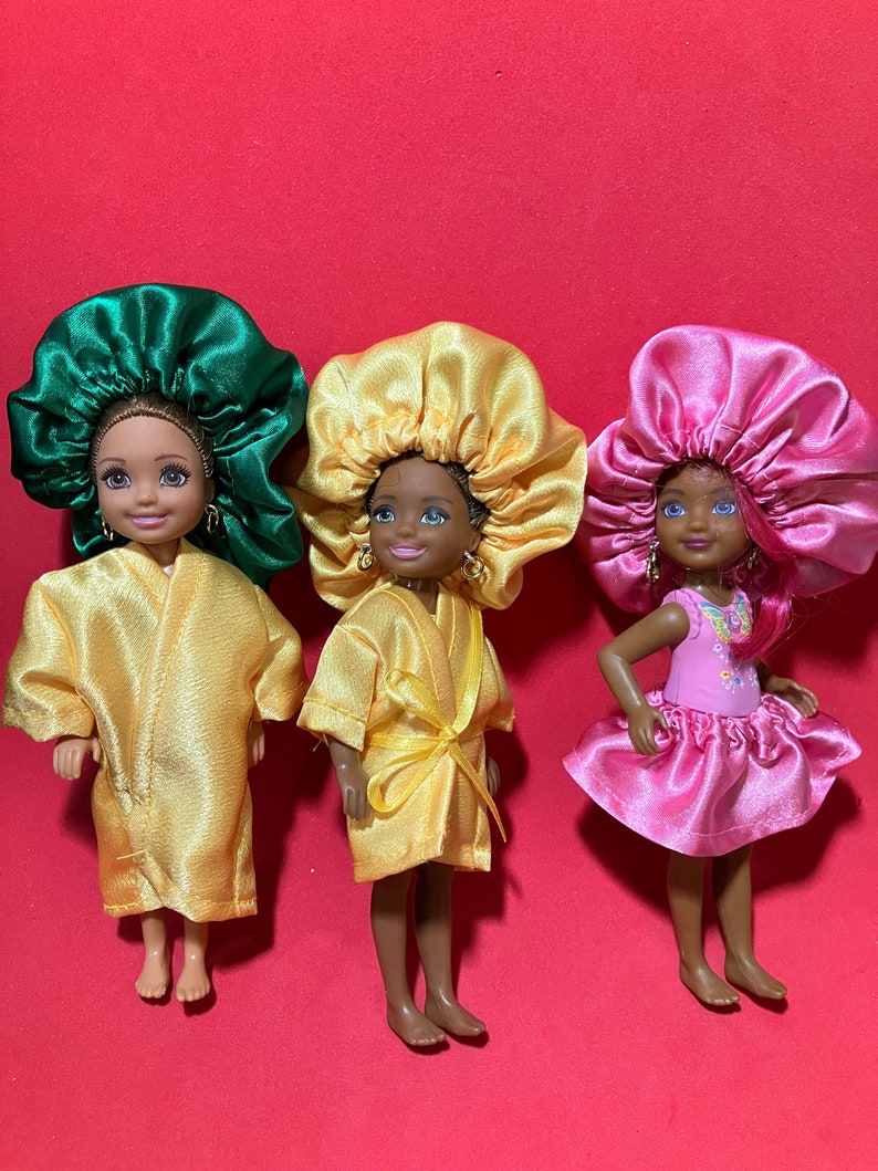 Doll Clothes -  Little Doll Bonnets   by Laylee M Doll Clothes- Free shipping in USA
Single Little Bonnets $9.99
Fits Chelsea Doll
Robes Matching Bonnet Yellow Sets $16.99