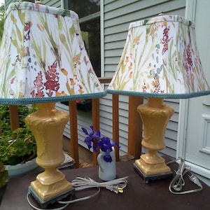 Pair of vintage lamps in ochre with elegant shades