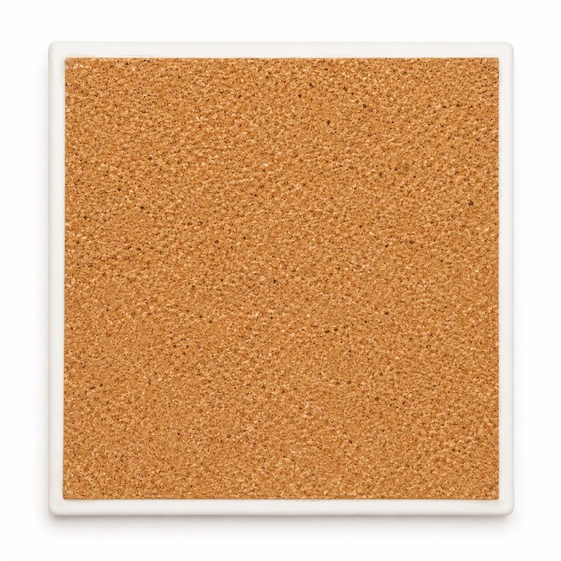 May include: Square ceramic coaster with a white border and a cork surface. The cork has a textured, light brown appearance. The coaster is designed to protect surfaces from heat and moisture.