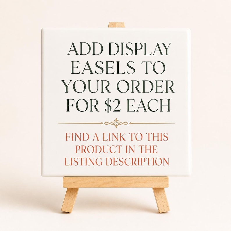 May include: A white square sign on a small wooden easel. The sign has text in dark green and red that reads "ADD DISPLAY EASELS TO YOUR ORDER" and "FIND A LINK TO THIS PRODUCT IN THE LISTING DESCRIPTION."