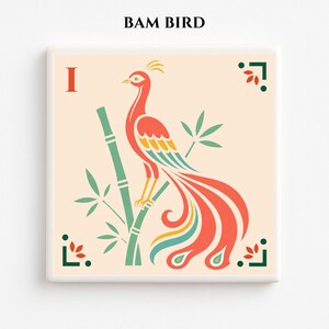 May include: Square art print featuring a stylized bird with a long, flowing tail, perched on a green bamboo stalk. The bird is primarily red, with yellow and teal accents. The print has the text "BAM BIRD" at the top and the letter "I" on the left.