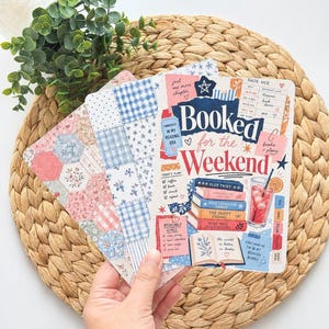May include: Three rectangular paper planner inserts with rounded corners. The top sheet features a colourful graphic design with the text Booked for the Weekend, a stack of books, a drink, and various reading-themed checklists and notes.