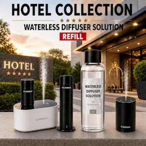 May include: Image of a 'Hotel Collection' waterless diffuser solution. The display features a white and black diffuser, two black cylindrical diffusers, and a clear bottle with a label. The label reads 'Waterless Diffuser Solution' by Eclatbreeze.