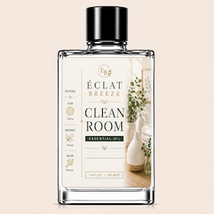 May include: A clear glass bottle of "Clean Room" essential oil with a black cap. The label features the text "Éclat Breeze" and "Clean Room Essential Oil". The bottle contains 3.4 fl oz (100 ml) of oil.
