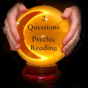 May include: A glowing yellow crystal ball with the text "2 Questions Psychic Reading" on it, held by two hands.
