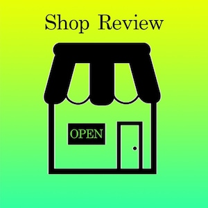 May include: A black and white illustration of a shop with the word "Shop Review" at the top. The shop has an awning, a door, and a sign that says "OPEN". The background is a gradient of green and yellow.