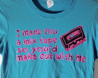 Verbosità "Mix Tape" stampa su t-shirt turchese