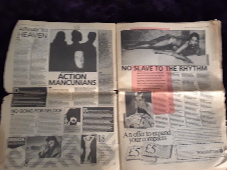 May include: A vintage newspaper spread featuring various articles and images. Headlines include "AIRWAY TO HEAVEN", "ACTION MANCUNIANS", and "NO SLAVE TO THE RHYTHM". The layout includes black and white photographs and text columns.