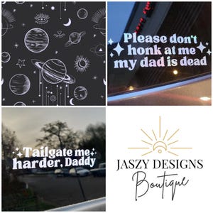 May include: A collage featuring a black background with white celestial patterns, a holographic decal reading "Please don't honk at me my dad is dead" with star icons, a white decal reading "Tailgate me harder, Daddy" with star icons, and a logo for Jaszy Designs Boutique.
