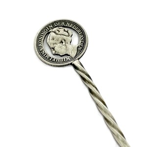 Queen Wilhelmina 1941 coin spoon. Hand made coin spoons appear to be World War 2 memorabilia.