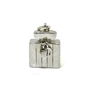 Perfume bottle silver charm. Detailed with lucky horse shoe charm on the bottle. Silver charm for bracelet or necklace
