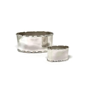 Set of 2 Oval napkin rings.  Silver hallmarked. Small and normal size napkin holder. Dutch silver hallmarked before 1953